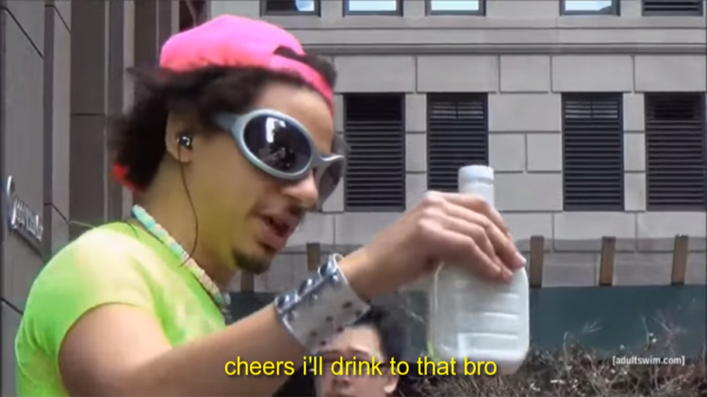 Man in a neon green shirt, pink backwards cap and sunglasses raising a white bottle, subtitled "cheers i'll drink to that bro"