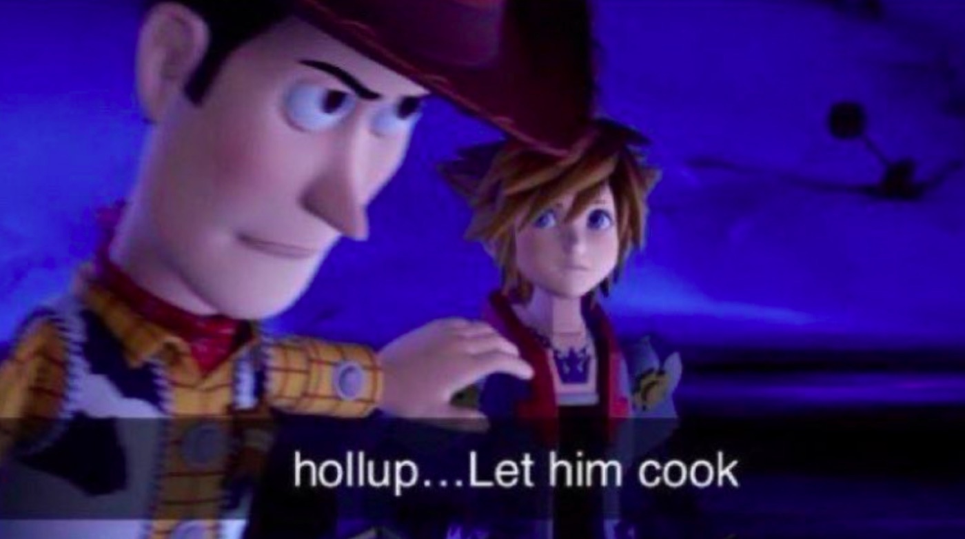 Video-game still of a cowboy doll resting a hand on a spiky-haired boy's shoulder, subtitled "hollup...Let him cook"
