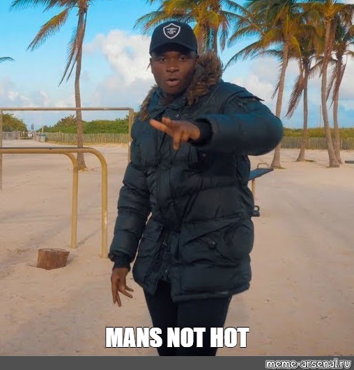 Man in a heavy black fur-hooded puffer jacket and cap on a palm-lined beach, captioned "MANS NOT HOT"
