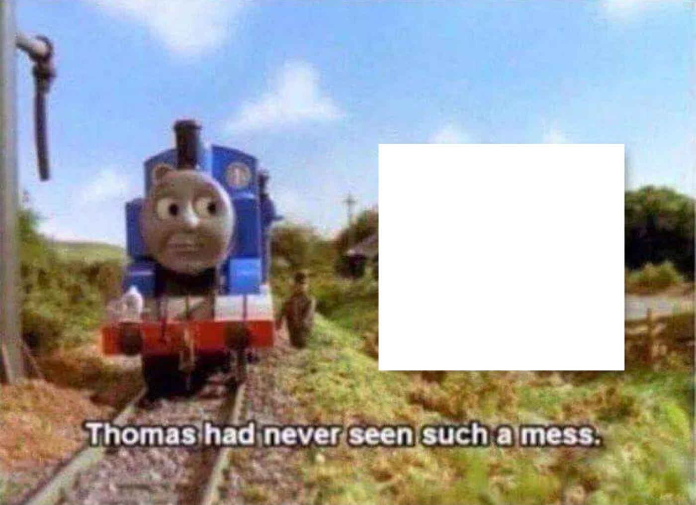 Blue tank engine with a wide-eyed face beside a blank white box, subtitled "Thomas had never seen such a mess."
