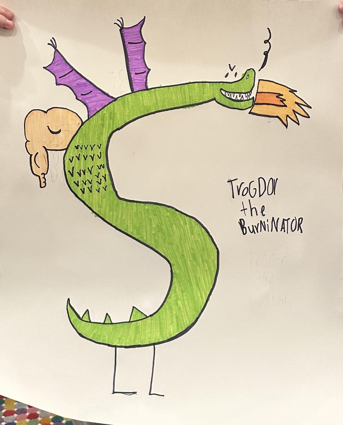A child's marker drawing of Trogdor the Burninator, a green dragon with one muscular arm